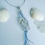sea glass in macrame fishing net with a