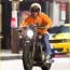 kj apa rides his motorcycle to dinner