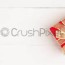 red gift box on wooden table background