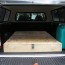 homemade truck bed storage and sleeping