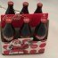 six coca cola bottles in case christmas
