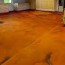 acid stained floor overlay is finishing