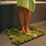 this moss shower mat lets you dry your