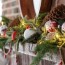 red and rustic christmas mantel