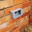 add an exterior outlet on a brick house