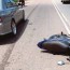 motorbike crashes into car