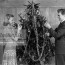1930s 1940s couple decorating christmas