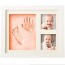 baby orange clay handprint and
